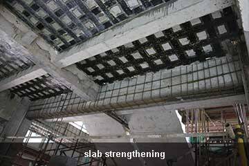 slab repair by unidirectional carbon fiber wrap